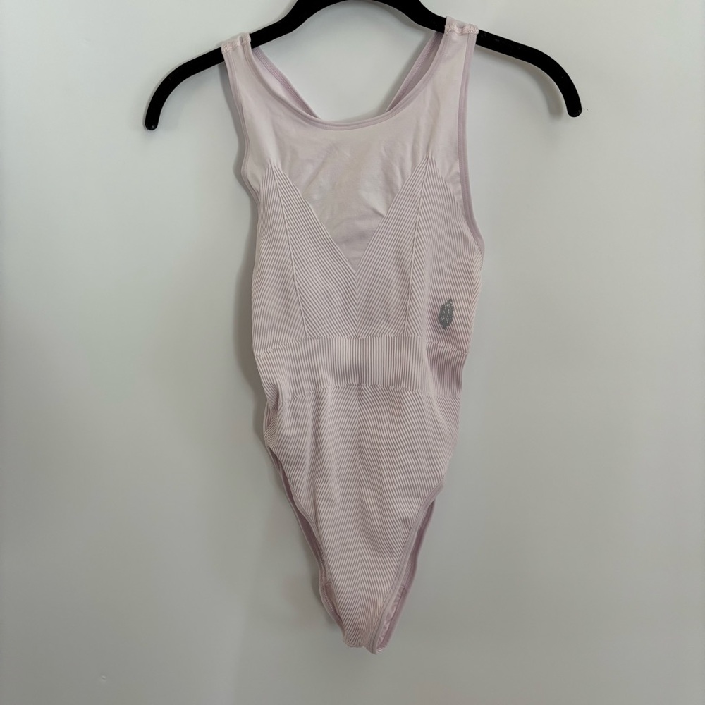 Free People Movement Bodysuit Rose Quartz Size M/L NWT